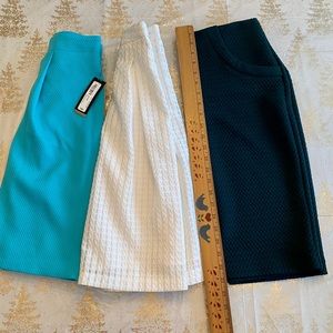 Three skirts in a set - 1 new with tags